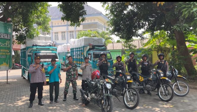 
 Polres Pasuruan Kota Laksanakan Pengamanan dan Pengawalan Penarikan Kotak Suara Pemilu 2024 ke Gudang Logistik KPU