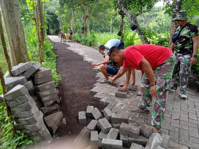 
 Pencapaian Pavingisasi Jalan di Desa Tegalan I Mencapai 50% dalam TMMD Ke 119 Kodim 0819/Pasuruan